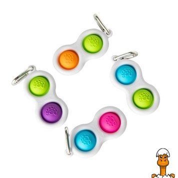 Мамалюк - Брелок-антистрес Fat Brain Toys Simpl Dimpl Кнопки 4 кольори в асорт. (F2111ML) Fat Brain Toys A4-F2111ML